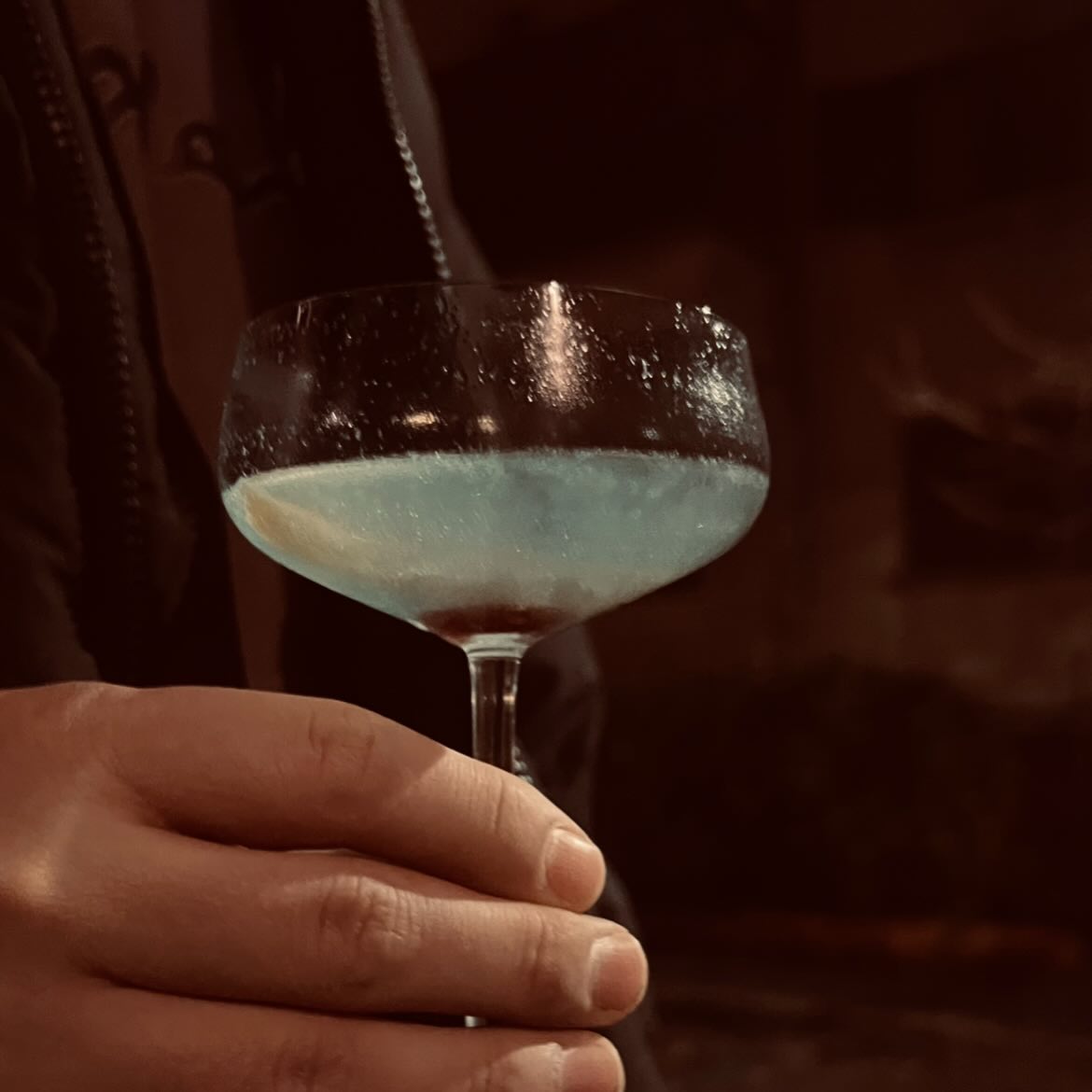 Coupe glass in low warm light